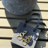 ⁨עגילי מורגן