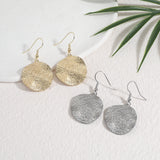 עגילי מטבע בראש