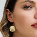 עגילי מטבע בראש